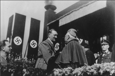 Pope  Pius exhaults Hitler at lavish spectacuar promoting the Nazi agenda  through associating with it